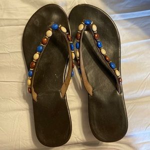 Flip flops. Brown size 10